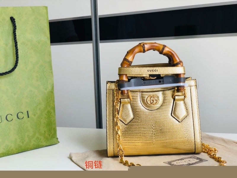 G*u*i top handle bags